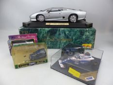 Model boxed cars to include a MAISTO XJ220 Jaguar in original box, Corgi classic morris van, Match