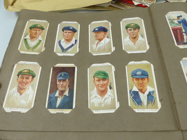 Selection of cigarette cards along with some loose stamps - Image 8 of 17