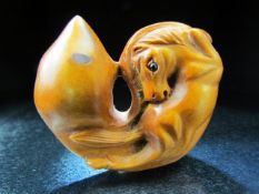 Japanese boxwood Netsuke in the form of a horse. Signed under