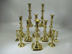 Selection of brass candlesticks