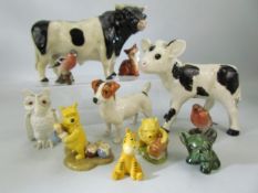Selection of marked pottery animals to include Beswick birds, Sylvac and the Walt Disney
