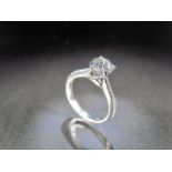 18ct white gold ladies Diamond ring set with a Round Brilliant centre stone and with diamond