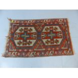 Red ground indian rug
