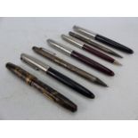 Seven various vintage pens including a 14ct nib ink pen, a silver hallmarked pencil by Wyvern etc