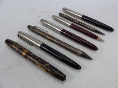 Seven various vintage pens including a 14ct nib ink pen, a silver hallmarked pencil by Wyvern etc