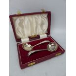 Hallmarked silver tea strainer and tea spoon. marked Sheffield Francis Howard Ltd.