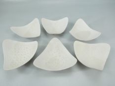 Set of 6 Blanc-de-Chine pin trays. Decorated lightly with shapes.