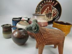 Selection of studio pottery from various artists over two shelves