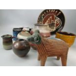 Selection of studio pottery from various artists over two shelves