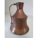 Unusual copper and brass shaped jug with large bulbous base.