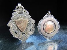 Hallmarked silver medals both set with Rose Gold plaques Approx weight - 29.2g