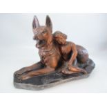Bronzed coloured figure of an Alsatian and a child signed Fedelpa