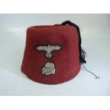 WWII German SS volunteers Red dress cap with central black tassel with woven eagle and totenkopf