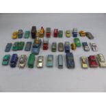 Collection of tin plate cars and vehicles to include Lesney, Budgie, Husky & Matchbox. All heavily