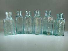 6 antique glass medicine bottles 'Lemonade', 'Fruit juices' etc