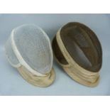 Two Vintage fencing masks by maker PAUL