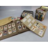 Selection of cigarette cards along with some loose stamps