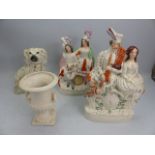 Two Large Staffordshire flatbacks, a staffordshire dog and a urn by Shorter & Son Ltd