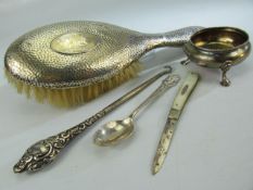 Collection of hallmarked silver items to include a silver backed brush, silver handled button