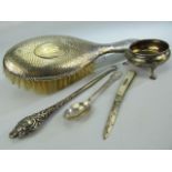 Collection of hallmarked silver items to include a silver backed brush, silver handled button