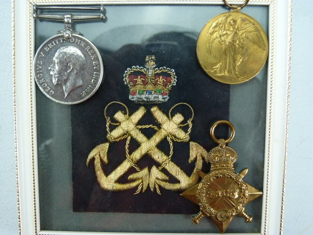 MILITARY MEDALS: Trio of WWI medals awarded to K. 11308 H. HAMMACOTT STO.1 .. R.N. accompanied by