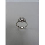 18ct White Gold approx: 1carat Diamond Daisy Cluster Ring, set with an approx: 0.25ct Brilliant