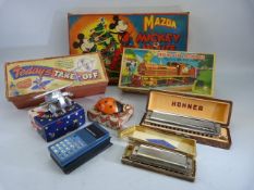 A collection of vintage items to include a set of mid 20th century Mazda Mickey Mouse Christmas