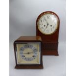 Pair of mantle clocks with keys and pendulums the largest with workings by Imperial