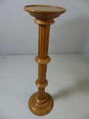 Carved wooden plant stand