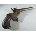 A vintage small calibre blank fire pistol, RGM marks rimfire