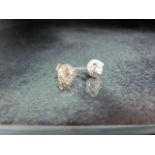 Pair of white gold diamond stud earrings of 1.1ct's