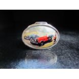 Silver pill box with enamel set lid depicting a vintage car