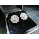 Pair of 14ct white gold pave set earrings of 1.2ct's approx