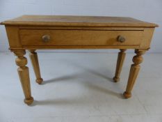 Antique pine console table with singe drawer and carved legs
