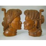 Indonesian style pair of carved wall plaques