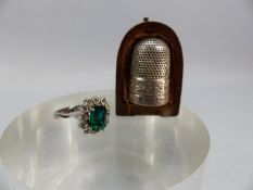 Silver thimble (hallmarked Chester 1899) and a fancy ladies ring