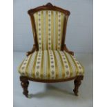 Upholstered bedroom chair on castors
