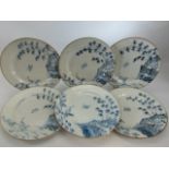 Six oriental hand-painted blue and white plates depicting herons and bamboo