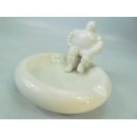 A Michelin Bibendum advertising ceramic ashtray in white