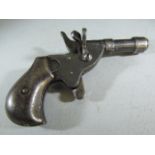 A vintage small calibre blank fire pistol, DR. JGA. GM marks rimfire