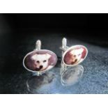 Pair of silver and enamel cufflinks with images of dog heads