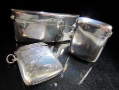Two hallmarked silver vesta cases and silver hallmarked card holder (total weight approx 74g)