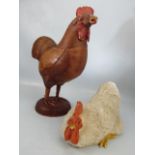 A Wicker crafted chicken and ceramic Hen