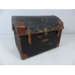 Antique dome topped fabric upholstered trunk