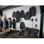 Large collection of military-style uniforms and accessories