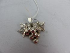 Mexican Silver Brooch depicting berries surrounded by leaves