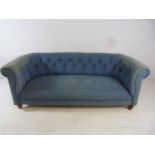 Victorian blue upholstered chesterfield