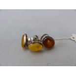 Three Silver rings Set with Amber & Butterscotch Amber