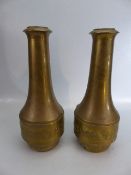 Daalderop pair of Dutch 20th century brass vases of fluted form.