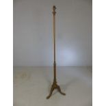 Brass and copper lamp stand on tripod serpent feet